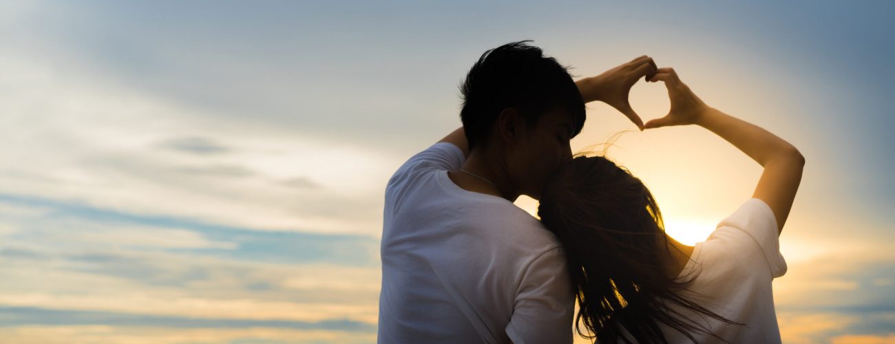 Young man and girl couple romantic dancing love leisure in celebration before married happy and fun at beach sunset vacation holidays, valentine day concept.