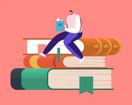 A man sits atop a tall stack of books, looking contemplative and surrounded by a cozy reading environment.