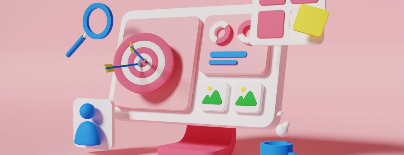 A computer with a target symbol on its screen, accompanied by a keyboard, set against a neutral background.