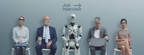 4 human are sitting in awaiting room for an interview. in the center is a robot waiting for an interview too.