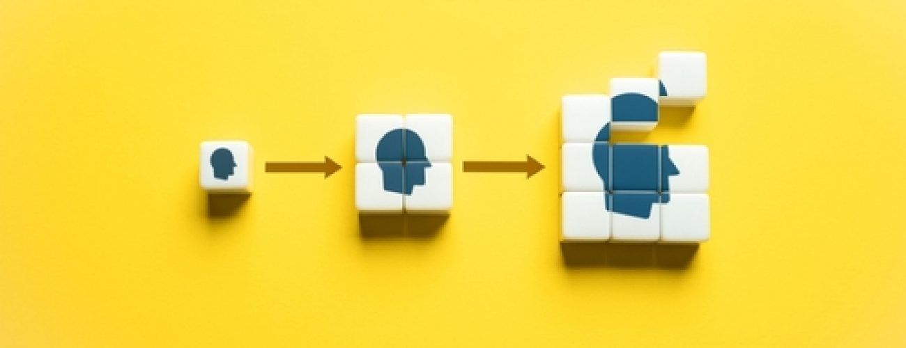 yellow background with 3 blocks that grow in size from small, medium and large.