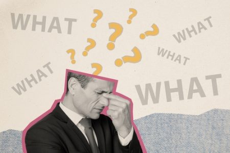 words saying what and a man holding the bridge of his nose